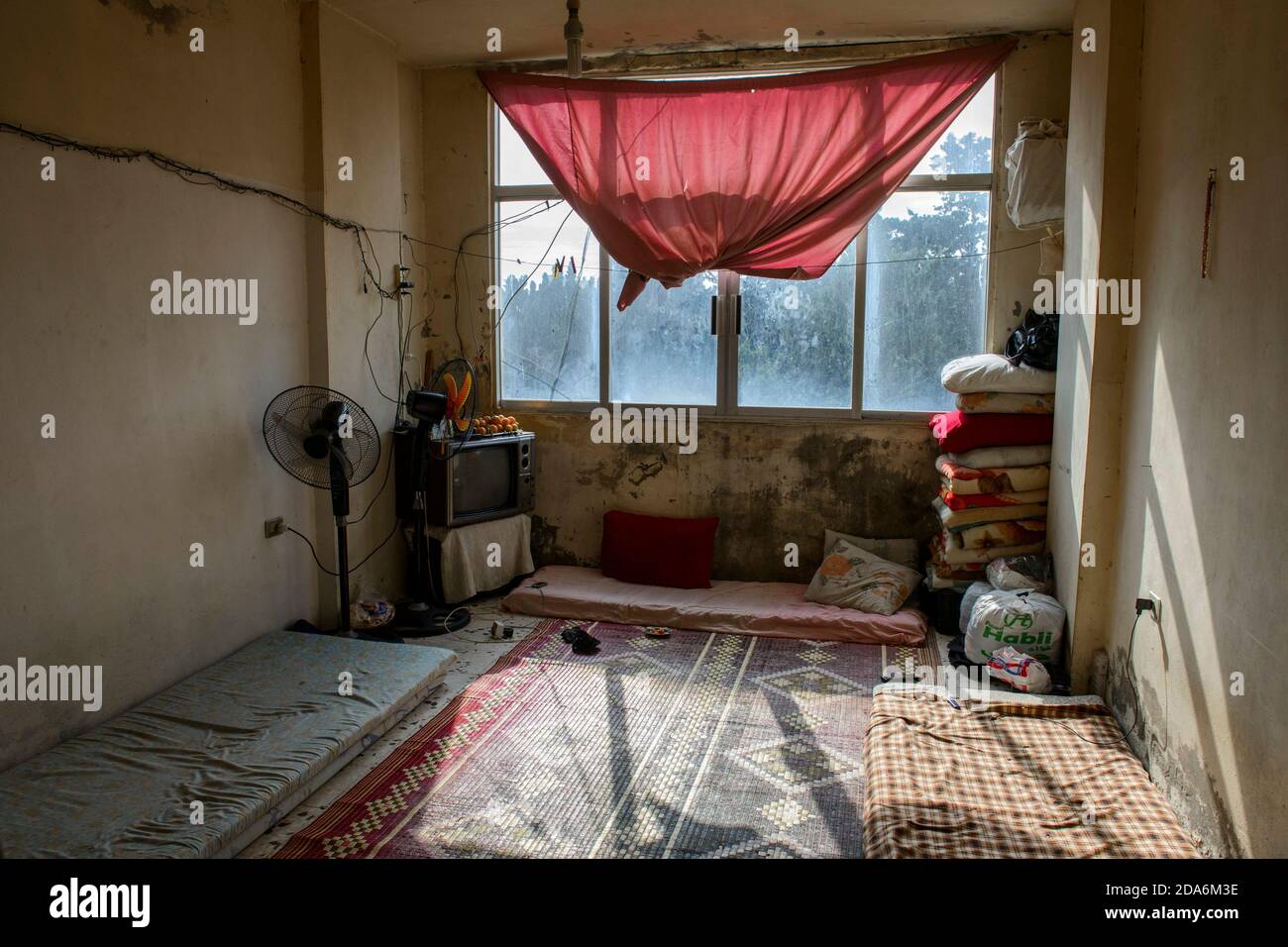 Saida-Lebanon. A room inside an abandoned construction site occupied by  Syrian refugees.This building is located in the center of Saida . The owner  gave access electricity and water free of charge to