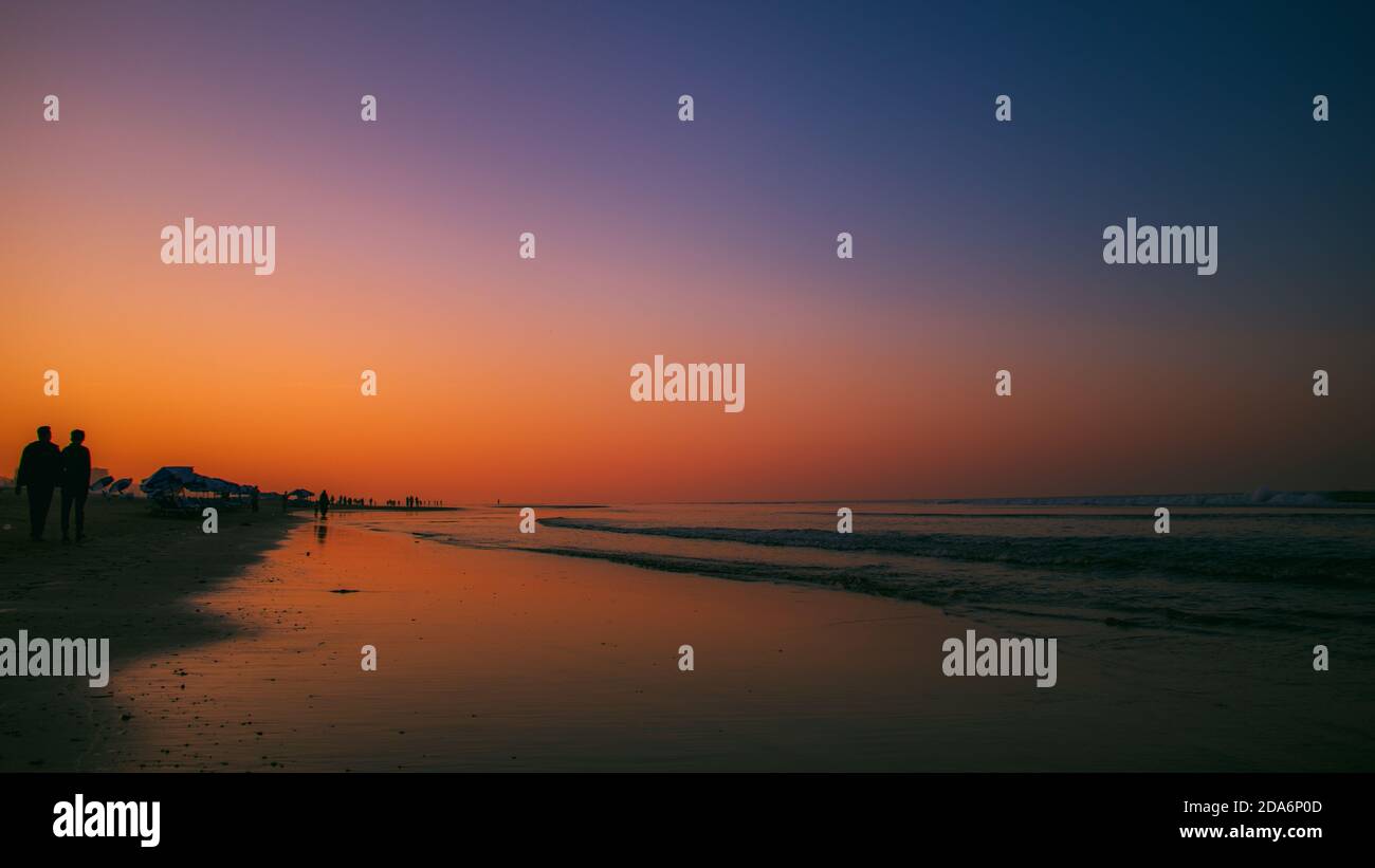 A beautiful landscape view of sunrise in Cox's Bazar Sea Beach. World longest sea beach Cox's Bazar. Stock Photo