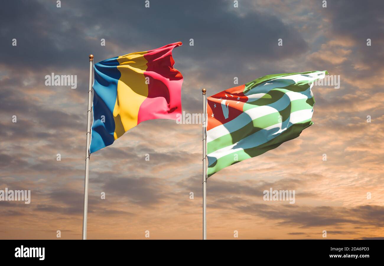 Beautiful national state flags of Abkhazia and Chad together at the sky ...