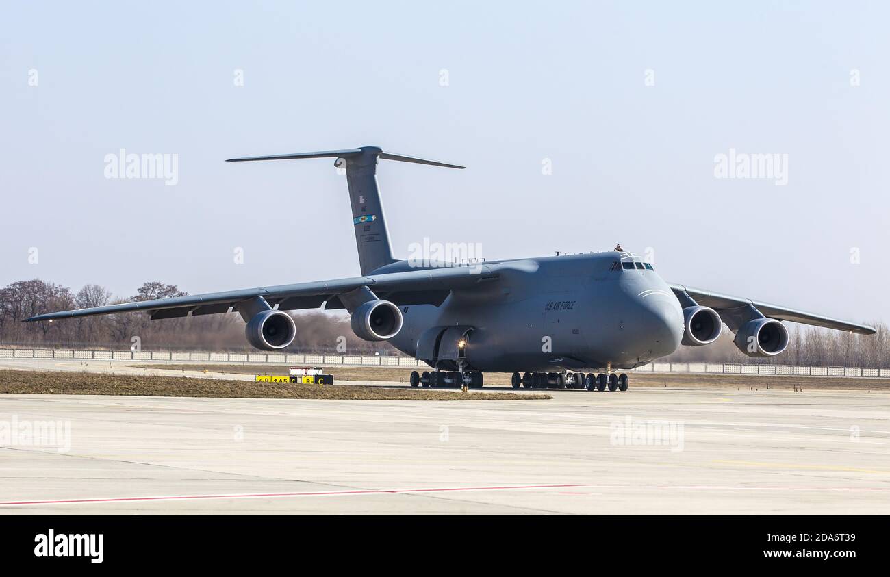 KIEV, UKRAINE - Mar. 25, 2015: The aircraft of the US Air Forces with the first batch of American armored vehicles at the international airport Borispol Stock Photo