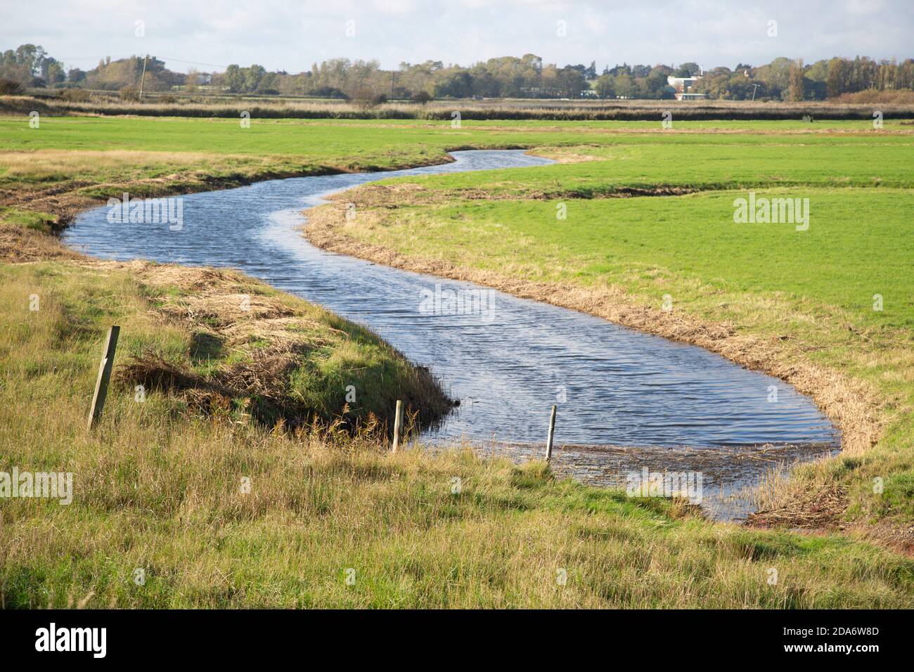 Drainage ditch stream on flat drained flood plain land, Hollesley