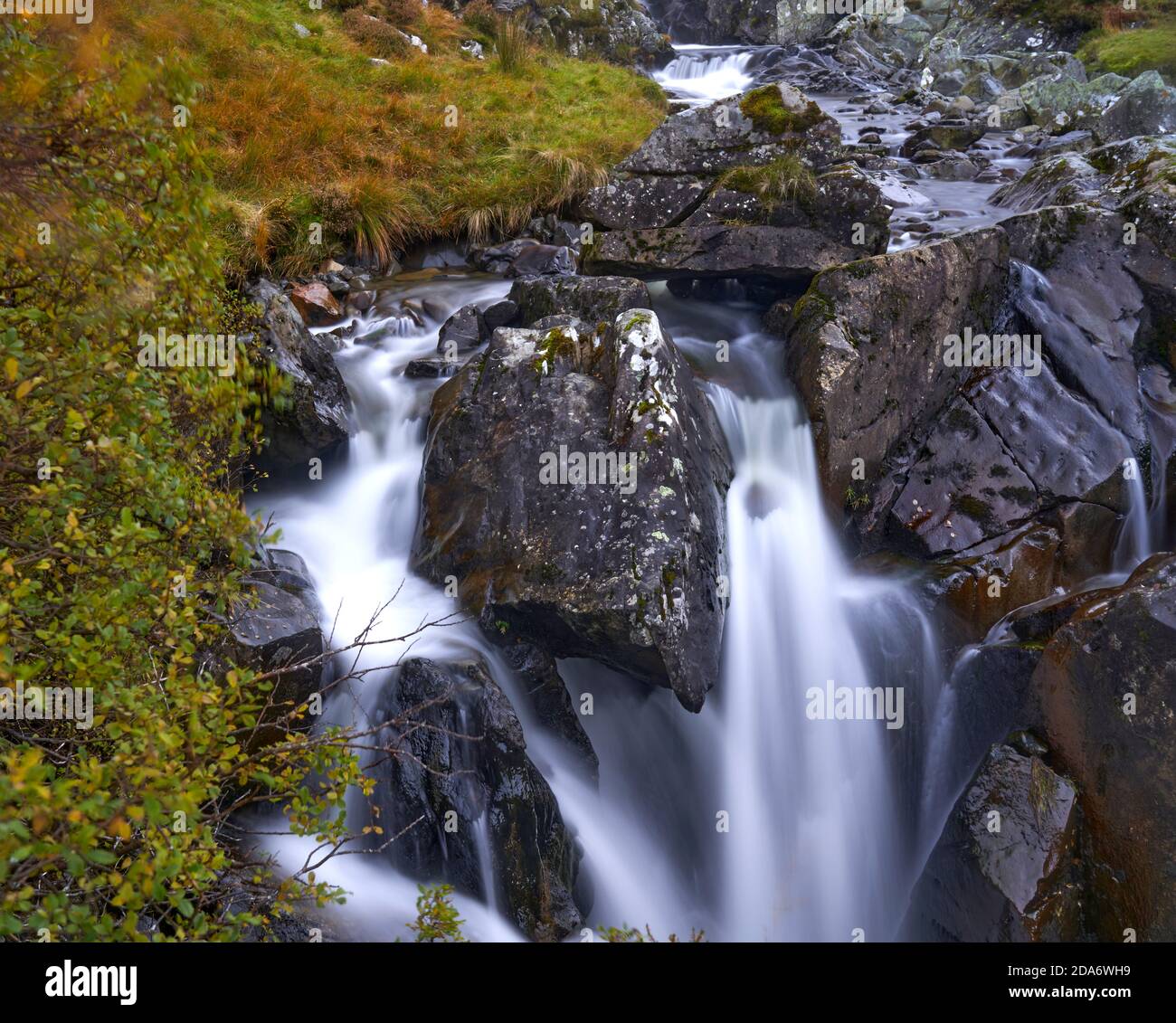 Beautiful waterfall with autumn colours in the Scottish Borders. Stock Photo