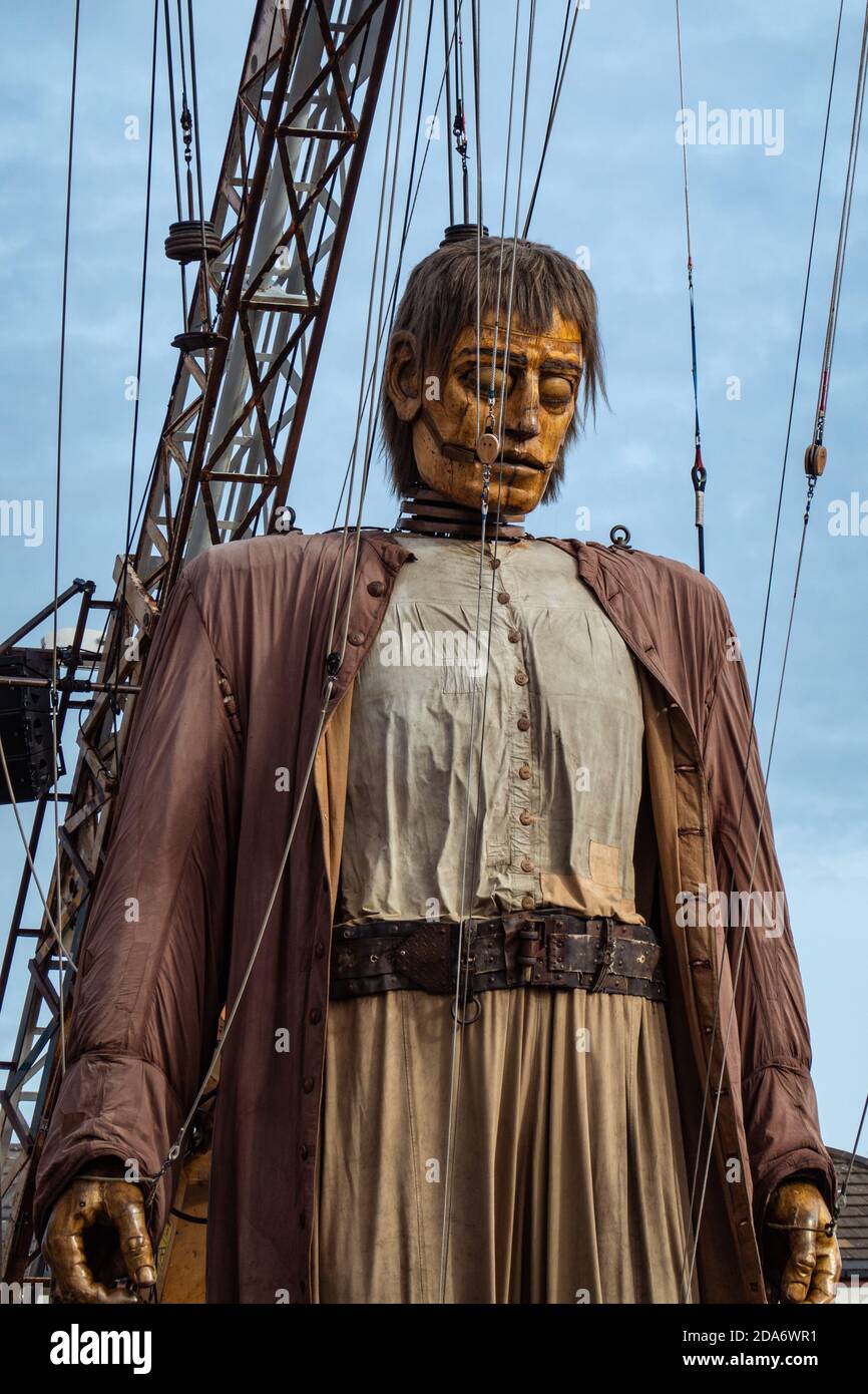 Royal De Luxe's Big Giant puppet makes his  progress through the streets of Liverpool, England Stock Photo