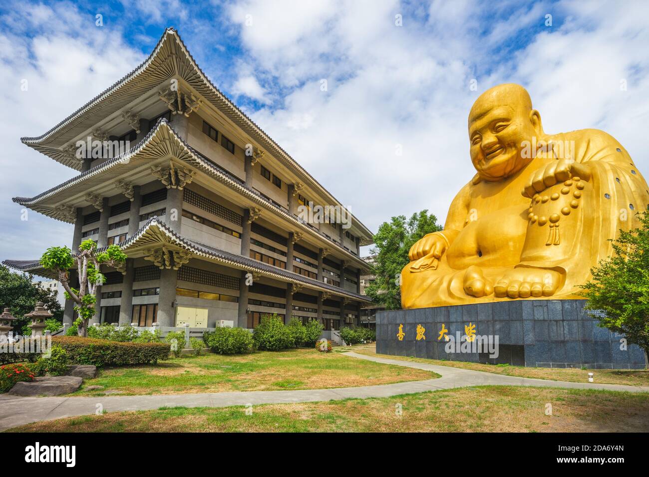 Paochueh Temple and Maitreya Statue in taichung, taiwan. Translation: to the satisfaction of all Stock Photo