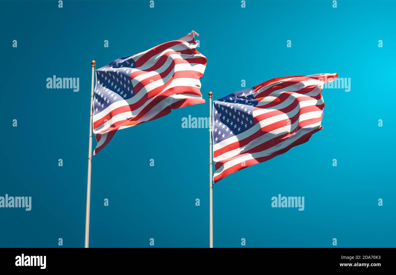 Beautiful national state flags of USA and USA together at the sky ...