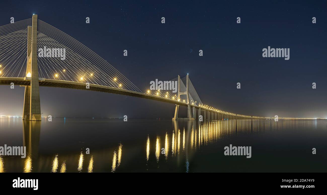 Vasco de Gama bridge at night with the lights on Stock Photo