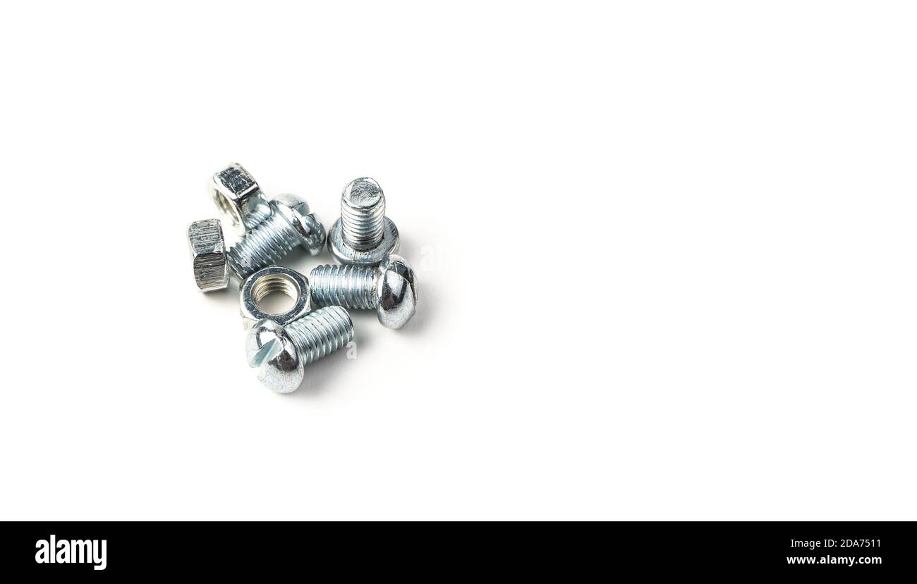 Screws and nuts on a white background. Stock Photo