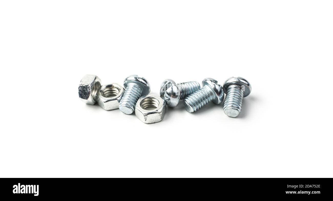 Nuts and screws on a white background. Stock Photo