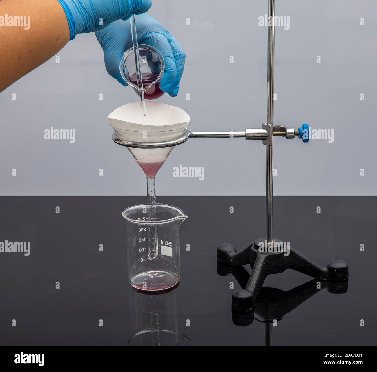 Filter paper in laboratory. Scientists are chemical filtration by