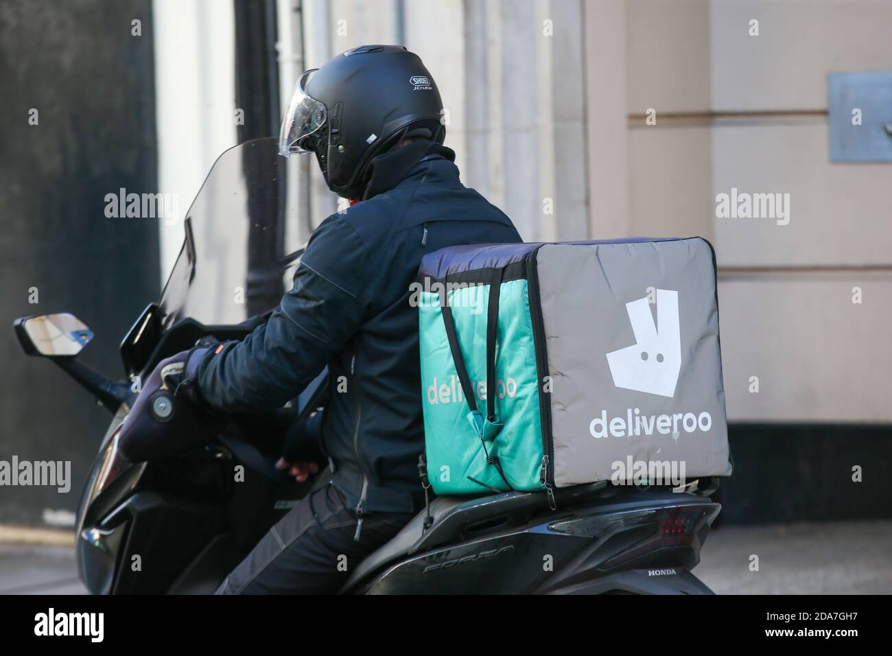Deliveroo Delivery driver, Richmond, Surrey, UK Stock Photo Alamy