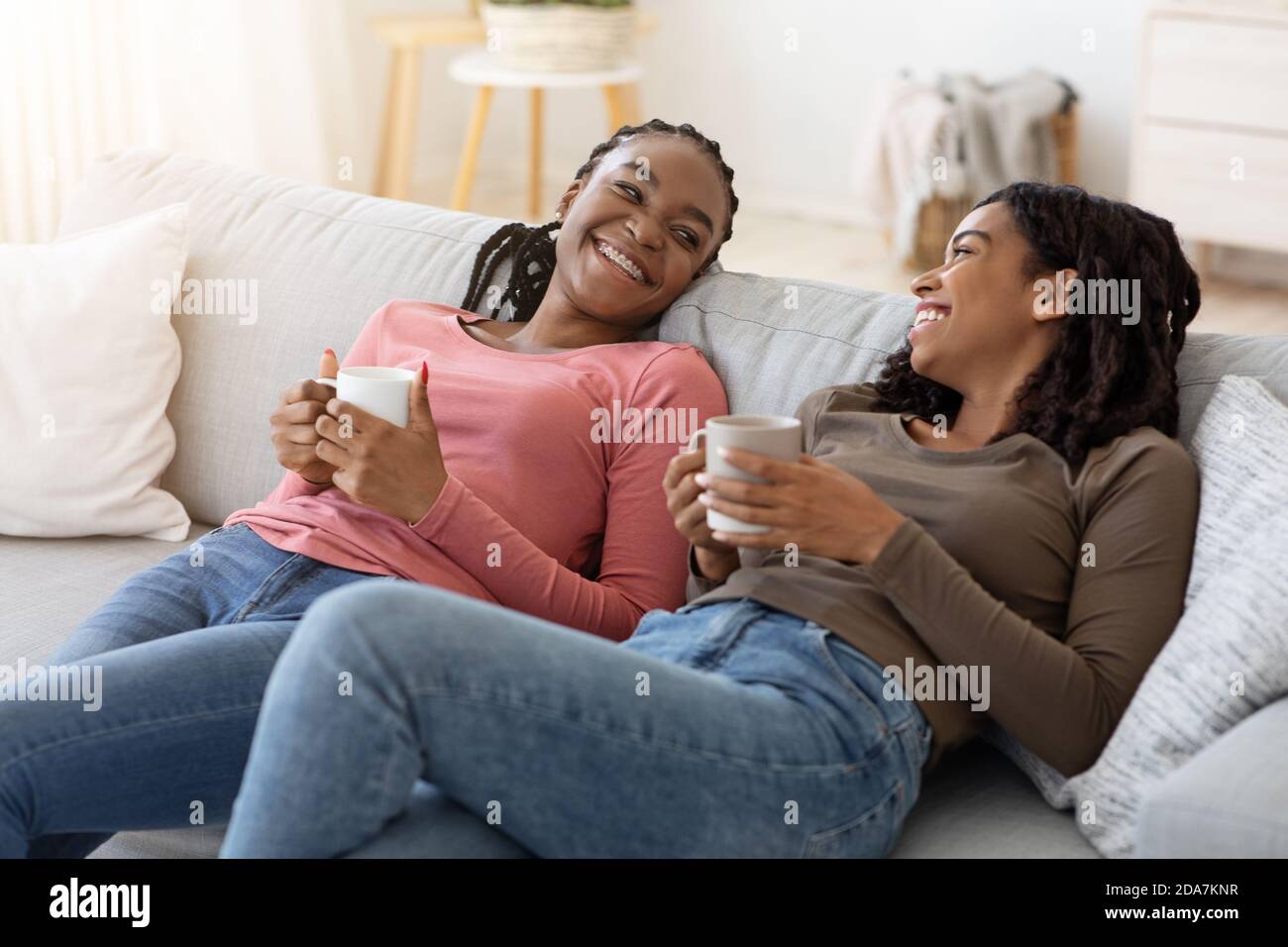 Two women talking sofa couch hi-res stock photography and images - Alamy