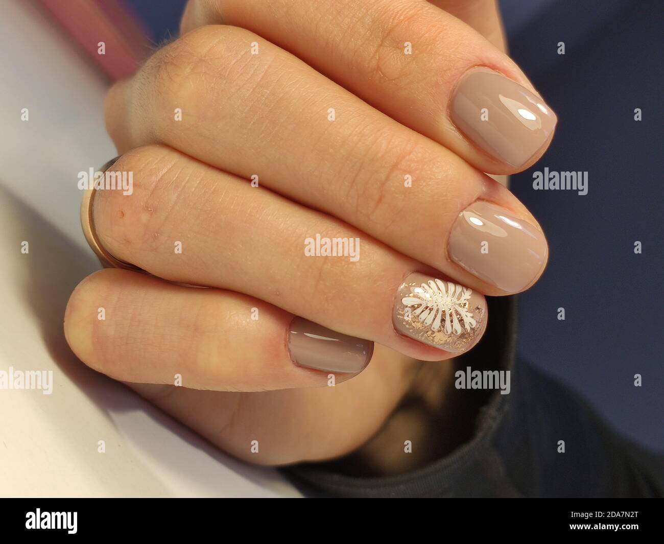 Christmas Nail art manicure. Winter Holiday style bright Manicure with gems  Christmas tree and snowflakes. Bottle of Nail Polish Stock Photo - Alamy