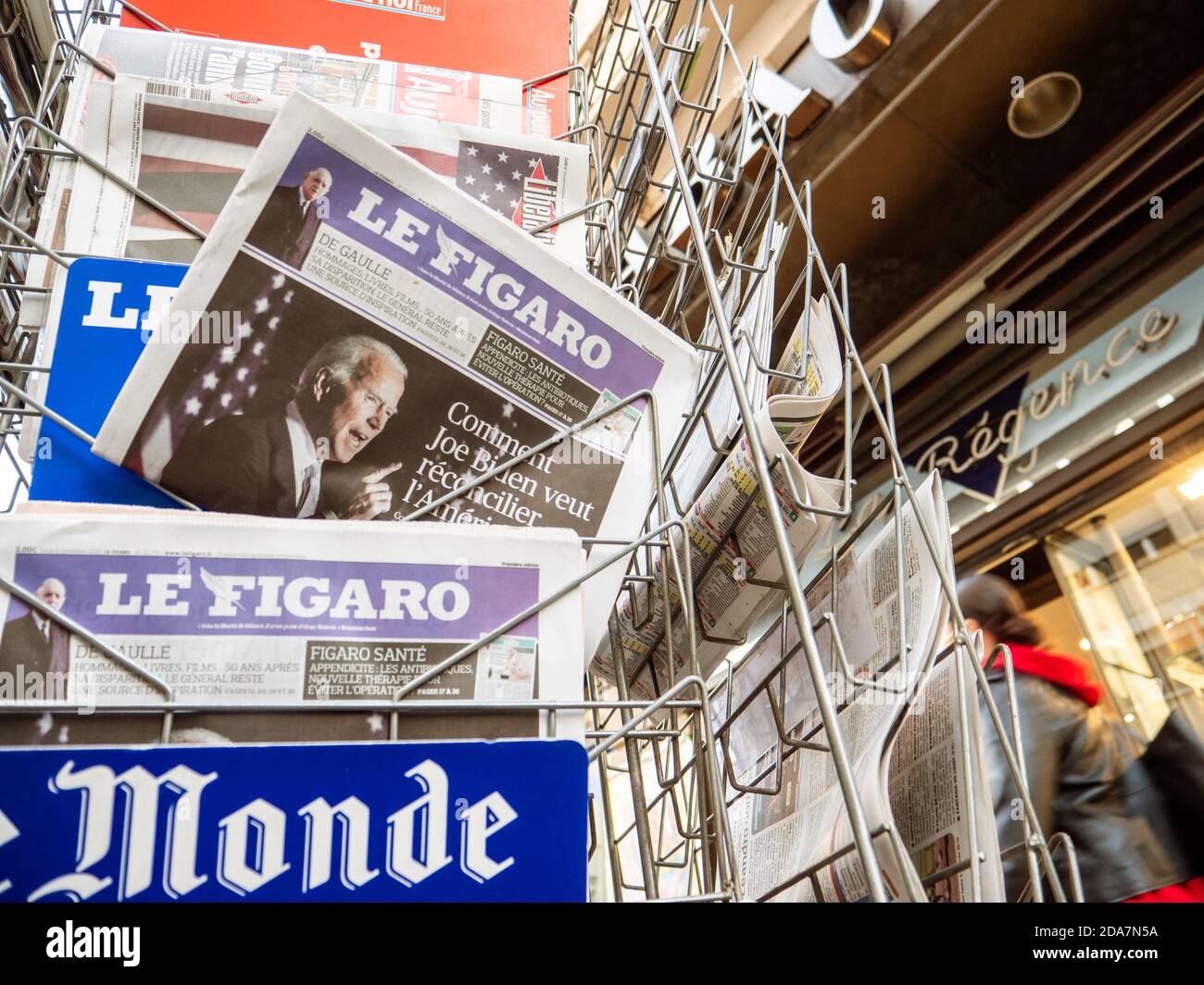 Paris, France - Nov 9, 2020: Multiple Le Figaro newspaper press kiosk with featuring confident Joe Biden's projected US presidential election victory against incumbent Donald Trump Stock Photo