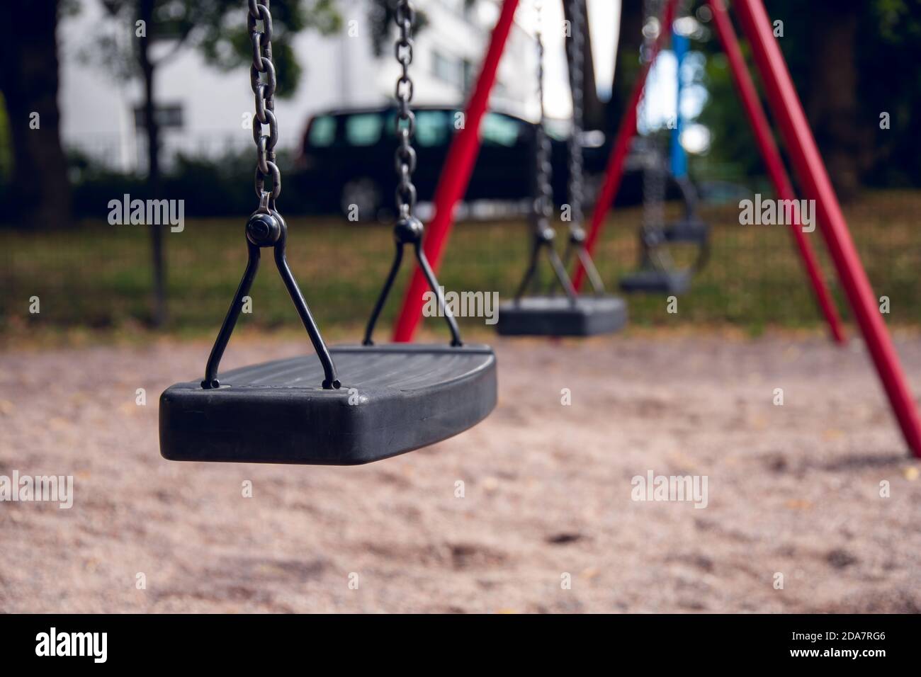 Black Swing With Red Posts In A Playground Stock Photo Alamy black-swing-with-red-posts-in-a-playground-stock-photo-alamy