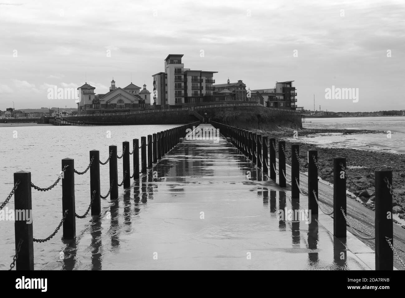 A walkway across the water in this photo taken at the seaside in Weston-super-Mare Stock Photo