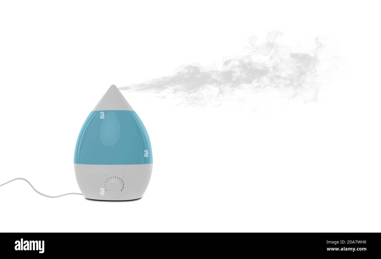The humidifier releases steam. White humidifier at work Stock Photo Alamy