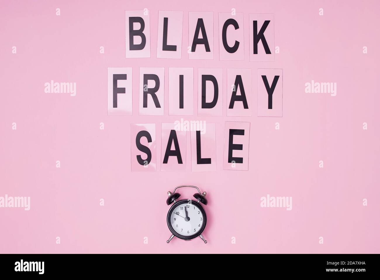 Black friday sale text and small clock Stock Photo
