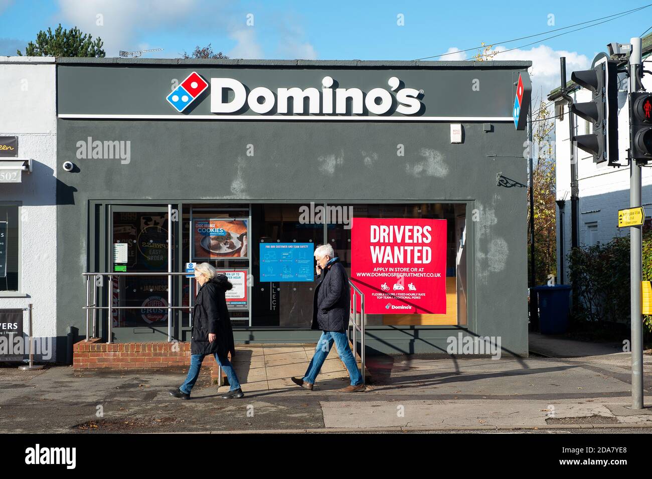 Sunningdale, Berkshire, UK. 10th November, 2020. A huge drivers wanted sign in the window of Domino's pizza in Sunningdale during the Coronavirus Covid-19 lockdown 2. Credit: Maureen McLean/Alamy Live News Stock Photo