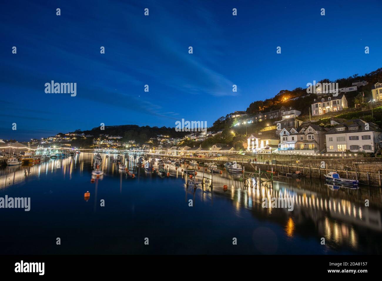 Looe Harbour in the evening, Looe is a seaside Town and fishing port in Cornwall, UK Stock Photo