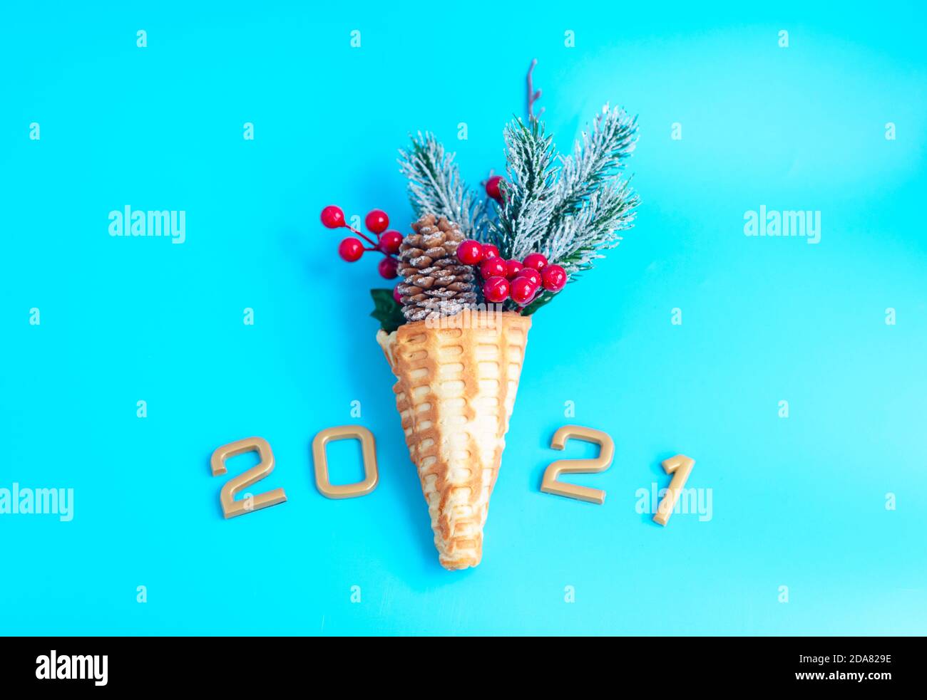 decorative Christmas bouquet of Christmas tree branch in a waffle cone