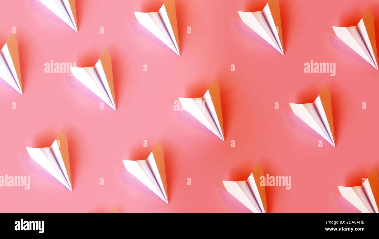 Paper planes in rows on a coral background. Travel or smm concept Stock Photo