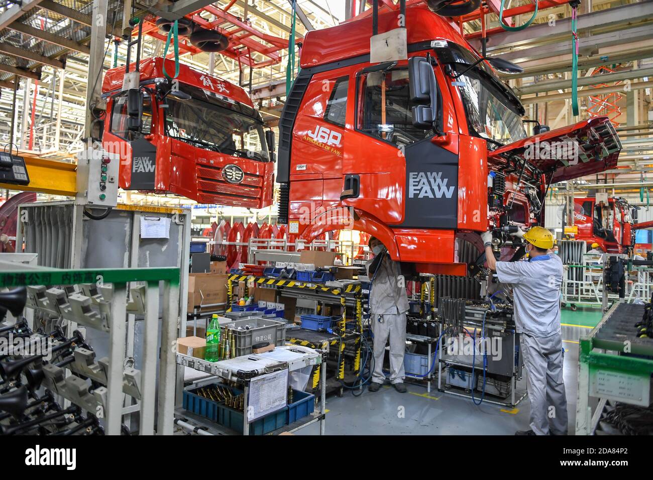 Changchun, China's Jilin Province. 1st Sep, 2020. Workers assemble vehicles at the general assembly line of FAW Jiefang, a truck-manufacturing subsidiary of First Automotive Works (FAW) Group Co. Ltd., in Changchun, northeast China's Jilin Province, Sept. 1, 2020. First Automotive Works (FAW) Group Co. Ltd., China's leading automaker, sold more than 3.01 million vehicles in the first 10 months of this year, an increase of 7.8 percent year on year, the company said. Credit: Zhang Nan/Xinhua/Alamy Live News Stock Photo