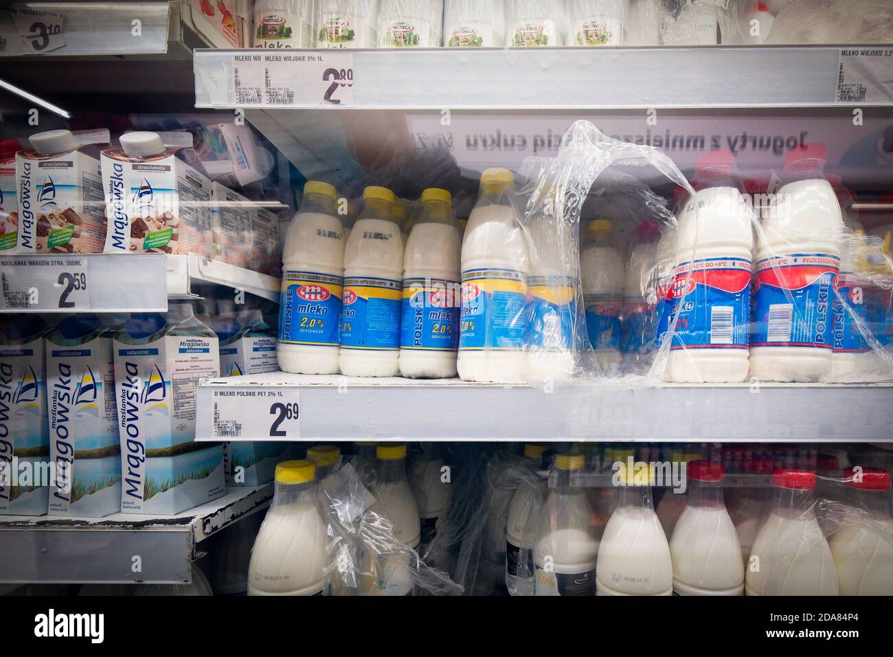 (201110) -- WARSAW, Nov. 10, 2020 (Xinhua) -- Bottles of Mlekovita branded milk are seen on shelves at a supermarket in Warsaw, Poland, Nov. 5, 2020. The European Union (EU) is one of the largest milk suppliers to Chinese market, with Poland accounting for a share of 12.7%, according to Director of Polish Milk Chamber Agnieszka Maliszewska. Statistics from Poland's Ministry of Finance show that, despite the impact of COVID-19, the export of dairy products from Poland to China grew by 70% year on year in the first half of 2020. Recently, batches of Polish dairy products took freight trai Stock Photo