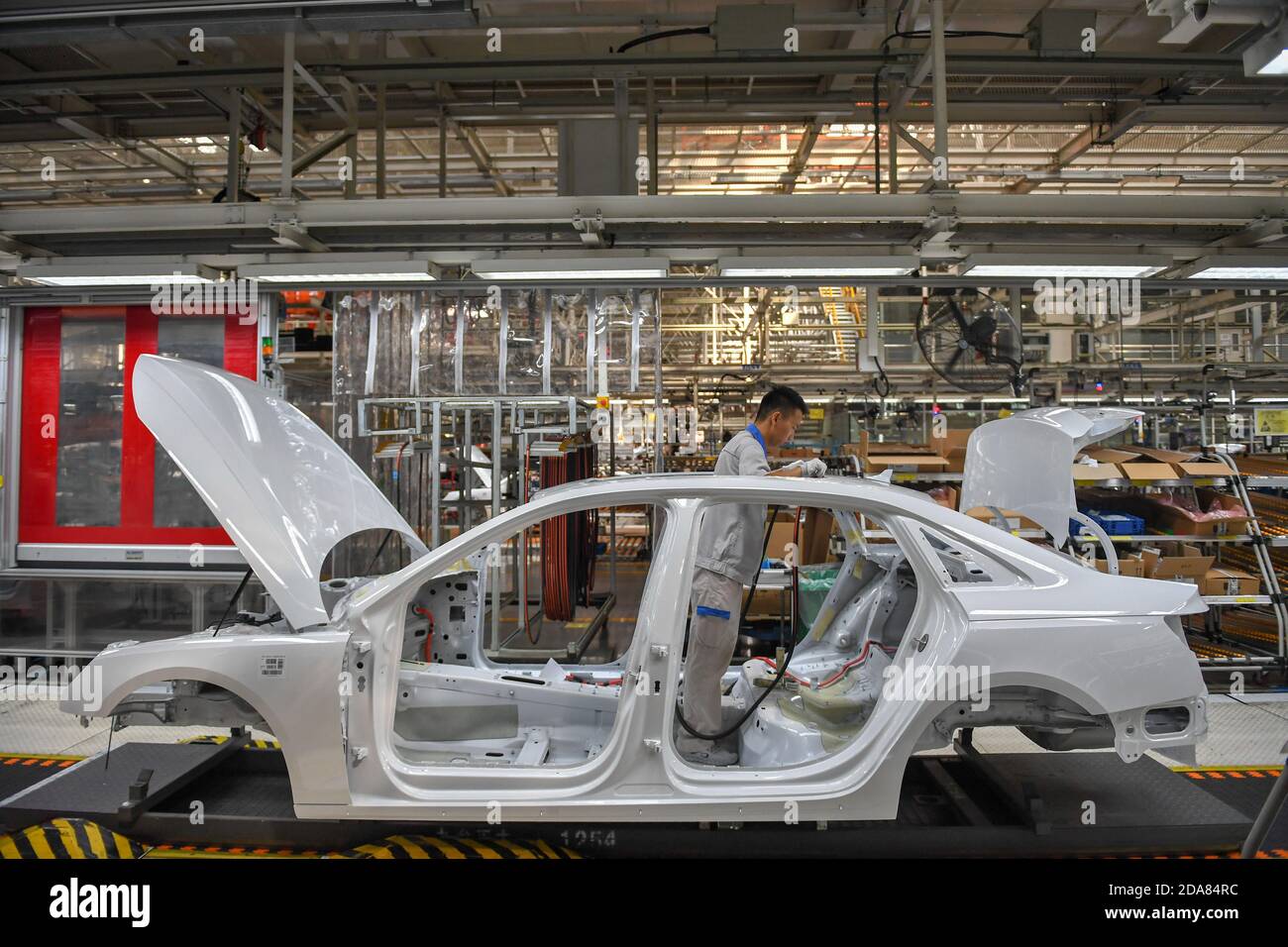 Changchun, China's Jilin Province. 1st Sep, 2020. A worker assembles a vehicle at the general assembly line of FAW-Volkswagen in Changchun, northeast China's Jilin Province, Sept. 1, 2020. First Automotive Works (FAW) Group Co. Ltd., China's leading automaker, sold more than 3.01 million vehicles in the first 10 months of this year, an increase of 7.8 percent year on year, the company said. Credit: Zhang Nan/Xinhua/Alamy Live News Stock Photo