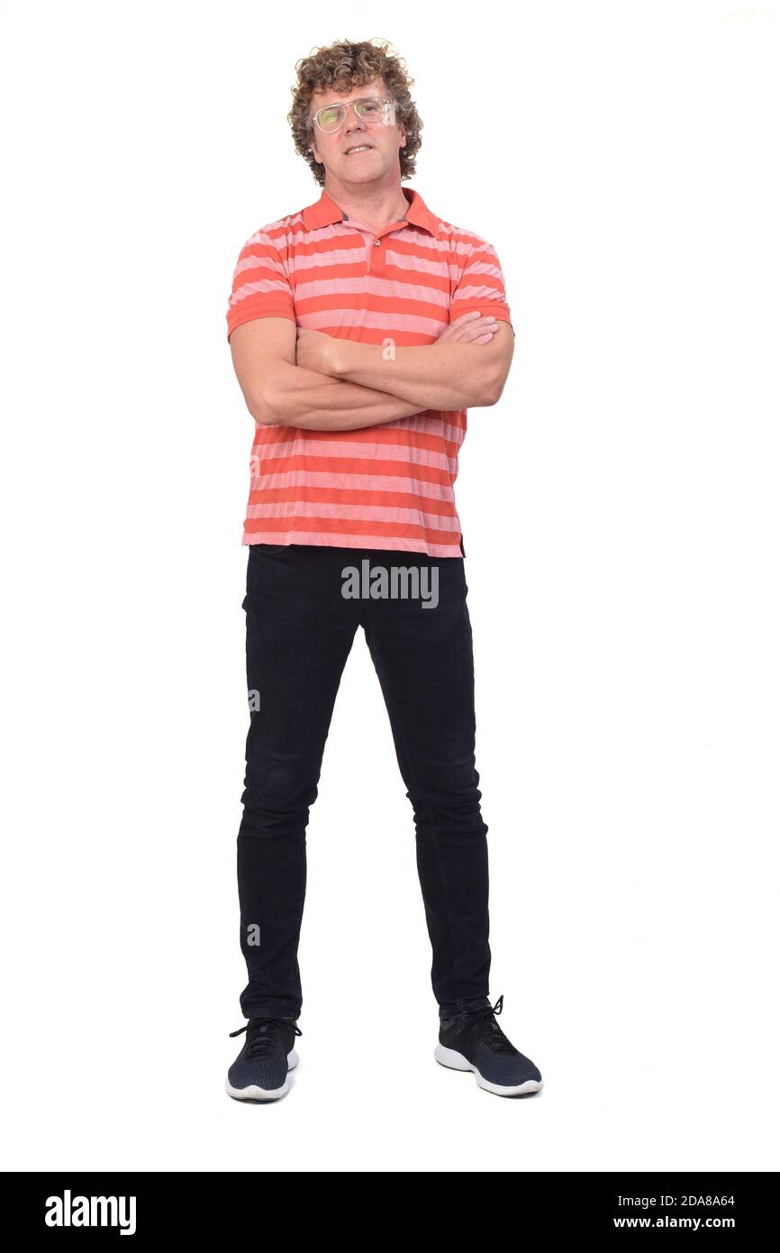 full portrait of a man with curly hair and white background, arms ...