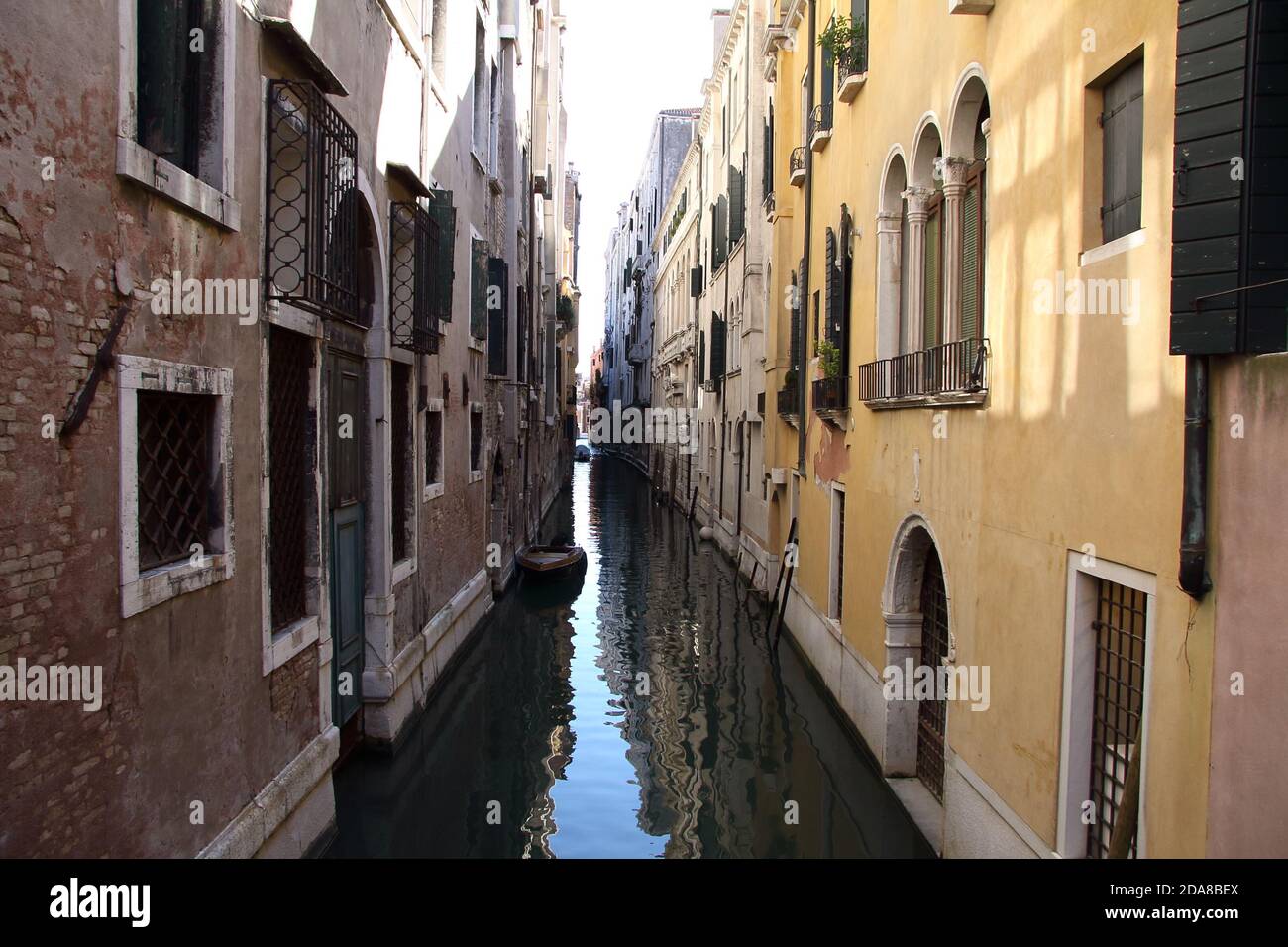 Narrow Water Alley in Venice Stock Photo