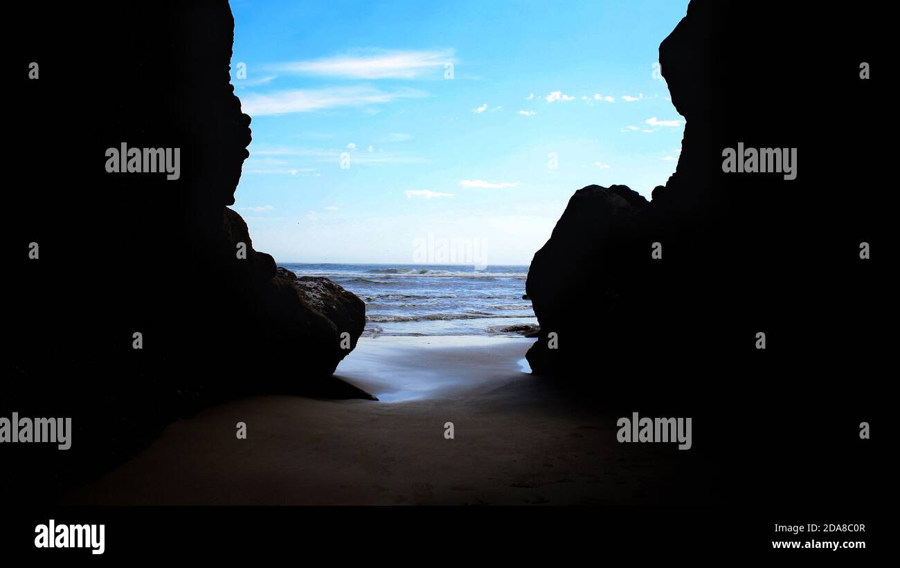 A view of the ocean from a cave Stock Photo