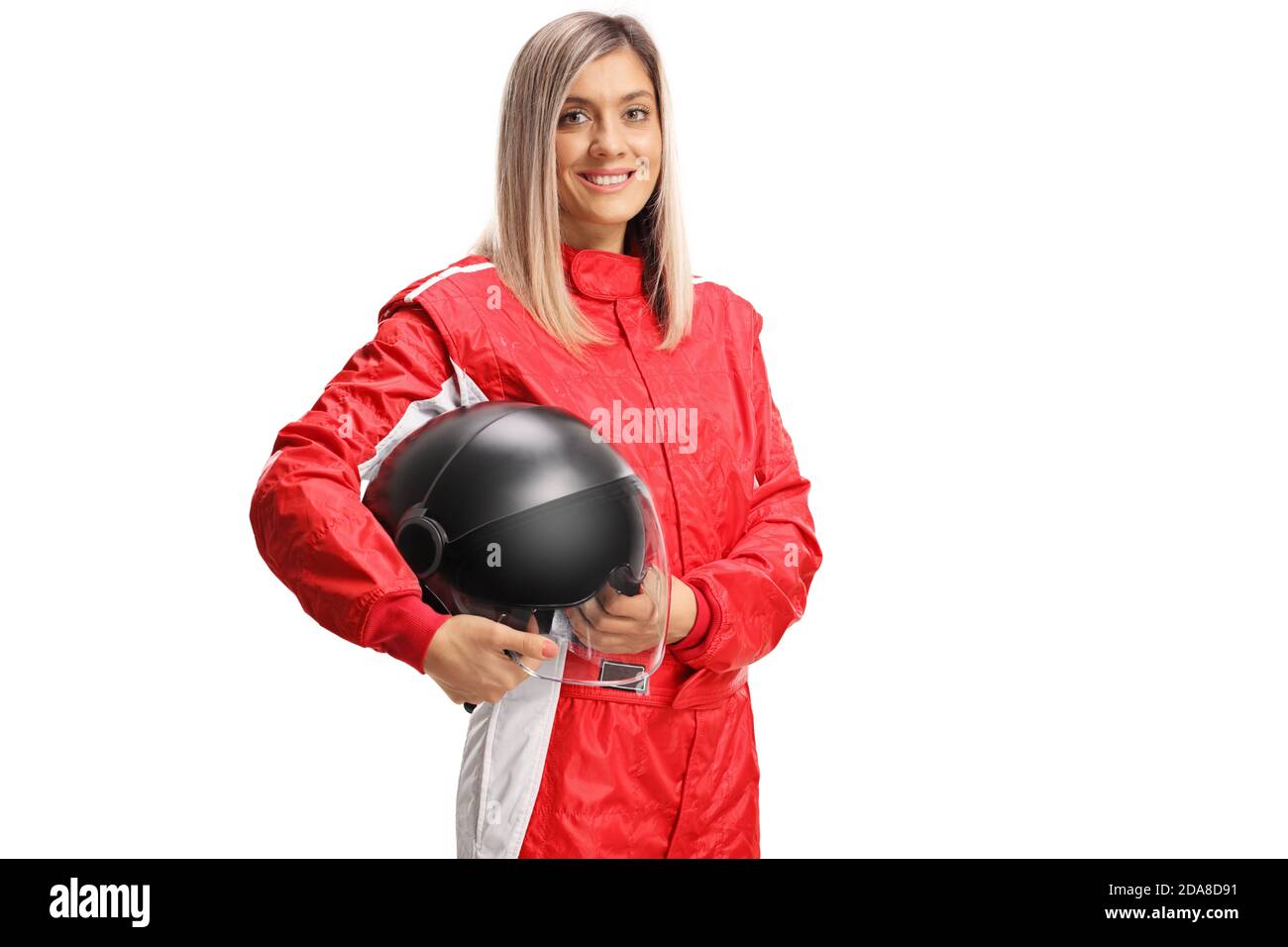 Smiling female racer holding a helmet isolated on white background Stock Photo