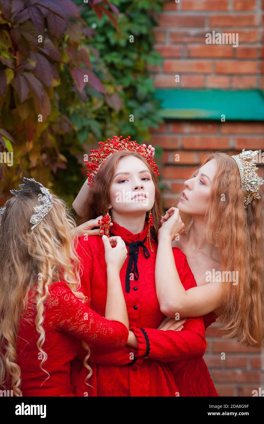 Russian Girls Are Beautiful Russian National Traditions Sisters In Crowns Wives From Abroad Girlfriends In Red Dresses Stock Photo Alamy