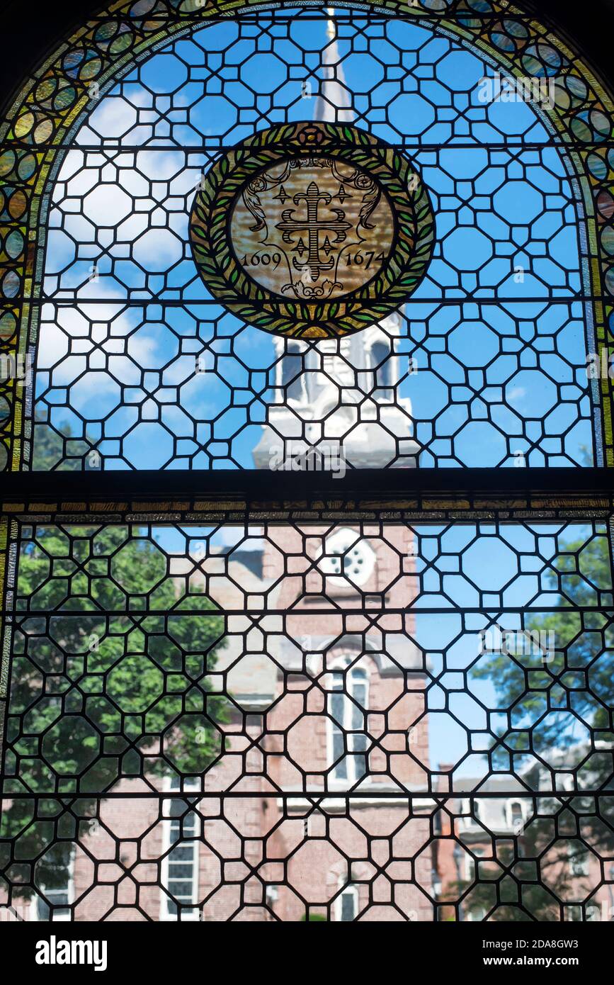 Springfield, Massachusetts.  September 8, 2019. A tiffany stained glass window within the george walter vincent smith art museum overlooking the cathe Stock Photo