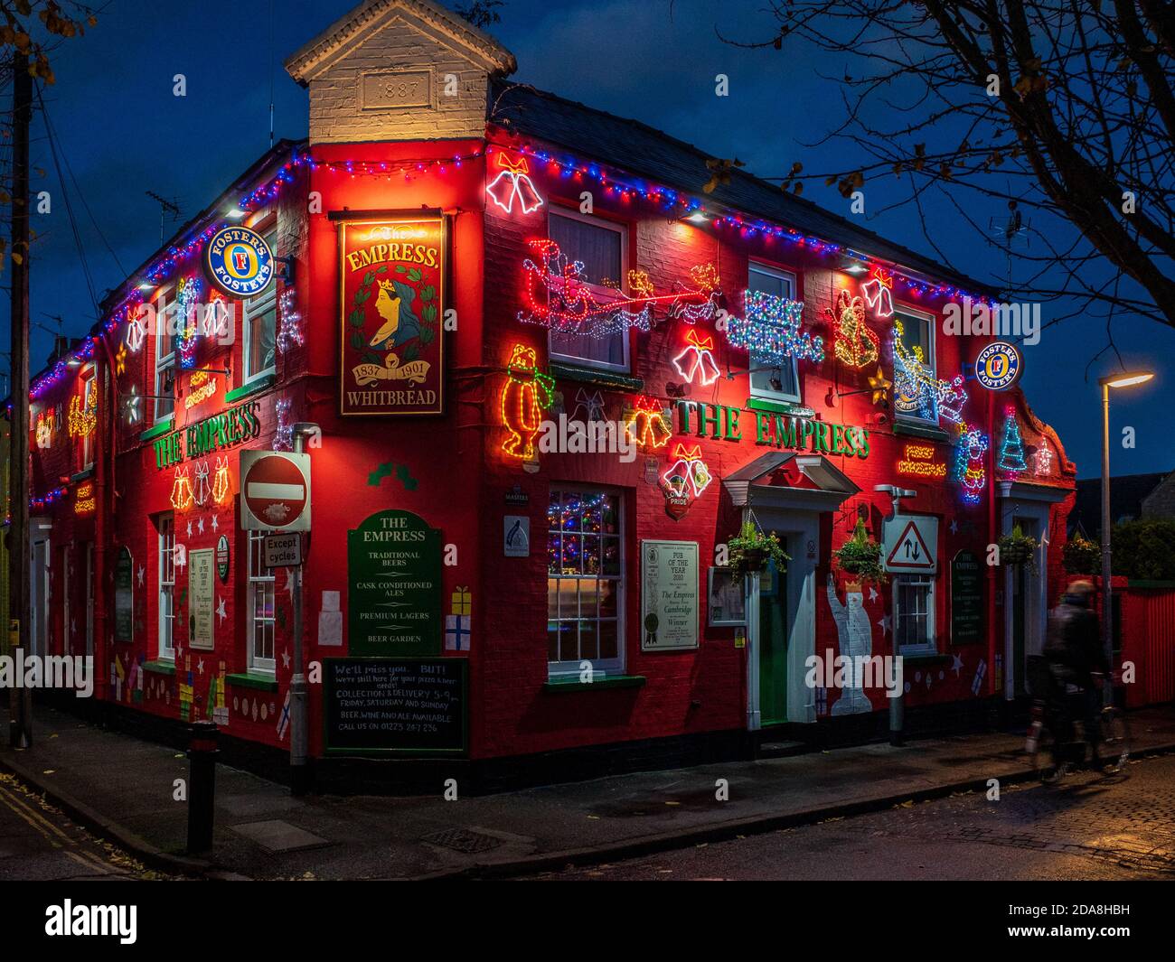 Xmas Lights brighten up the winter gloom at the Empress pub off Mill Road in Cambridge UK. Christmas Lights at the Empress Pub Cambridge. Stock Photo