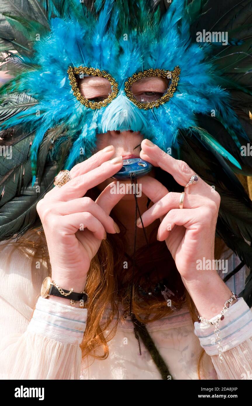 Woman With Feathery Mask At The Glastonbury Beltane Festival Glastonbury Somerset England UK Stock Photo