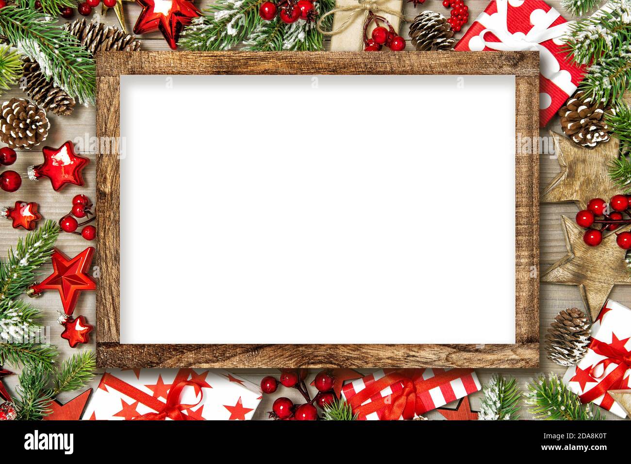Christmas decorations and red ornaments. Wooden frame mockup Stock Photo