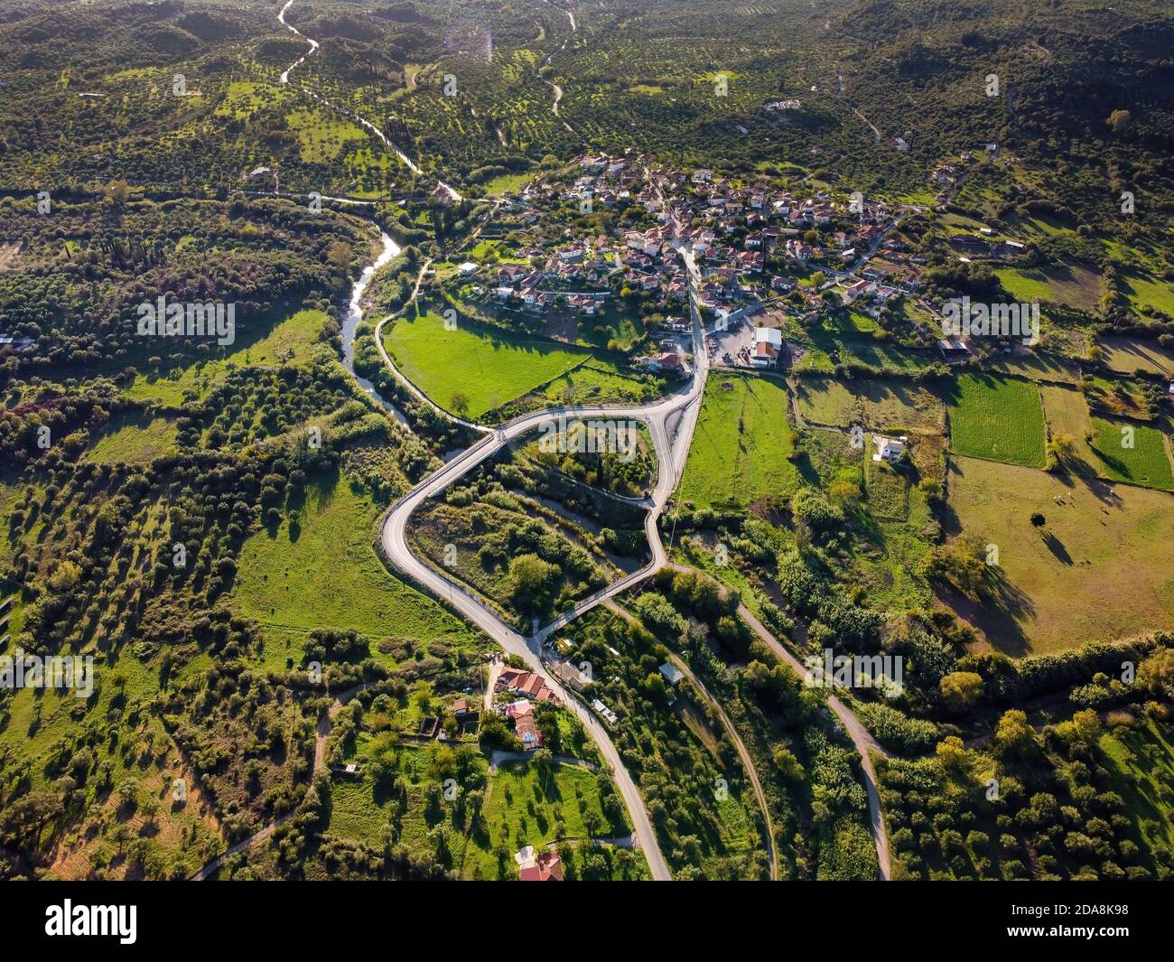 Aerial view of small village and crop fields at Autumn Stock Photo