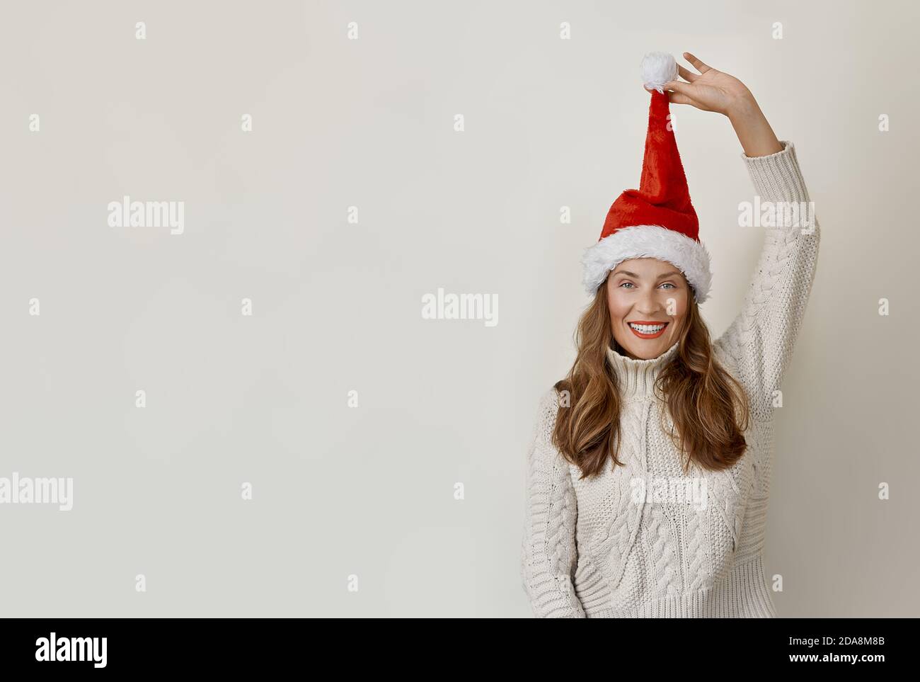Excited woman wearing santa hi-res stock photography and images - Alamy