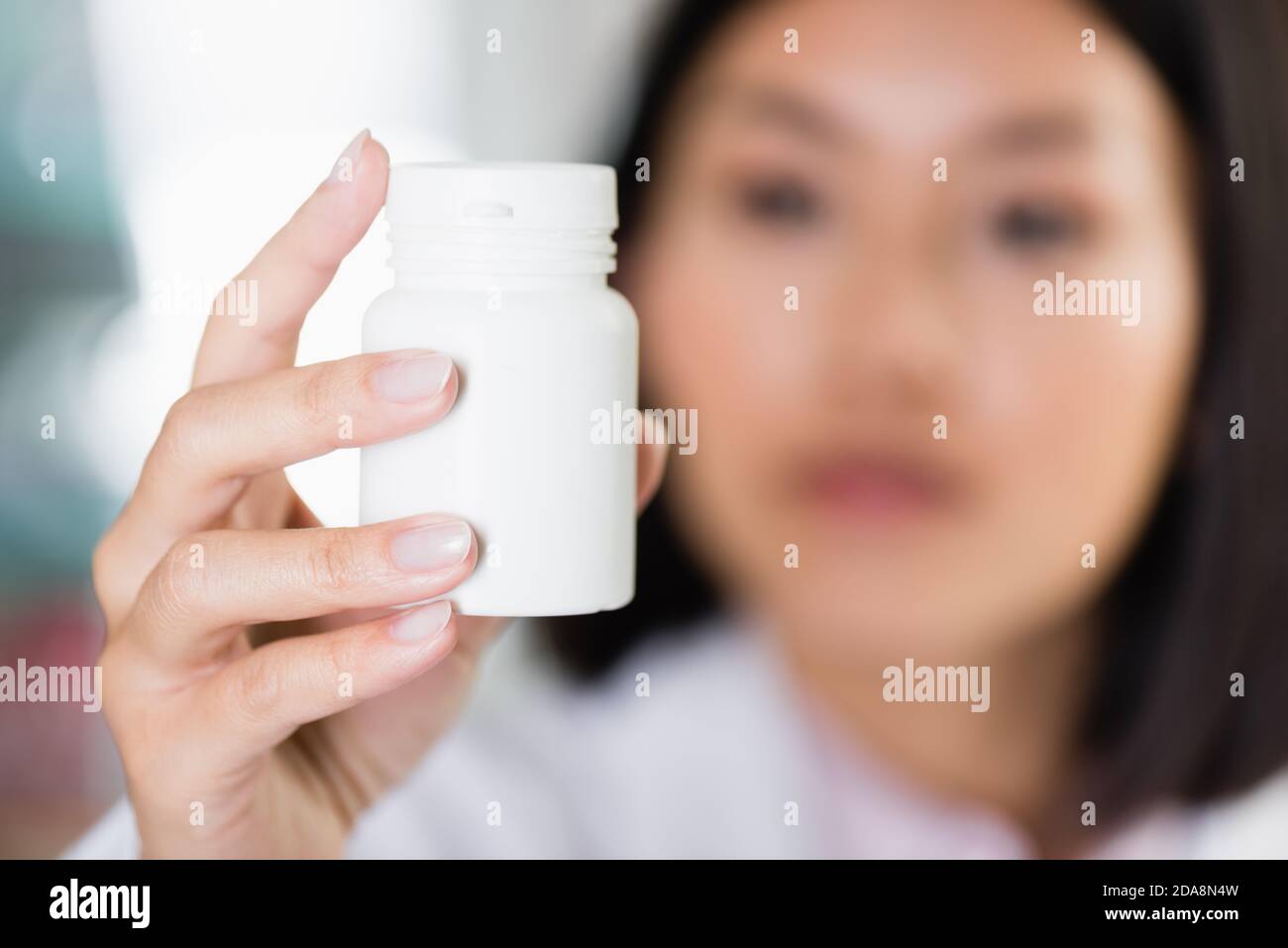 Asian young woman pharmacist hi-res stock photography and images - Alamy