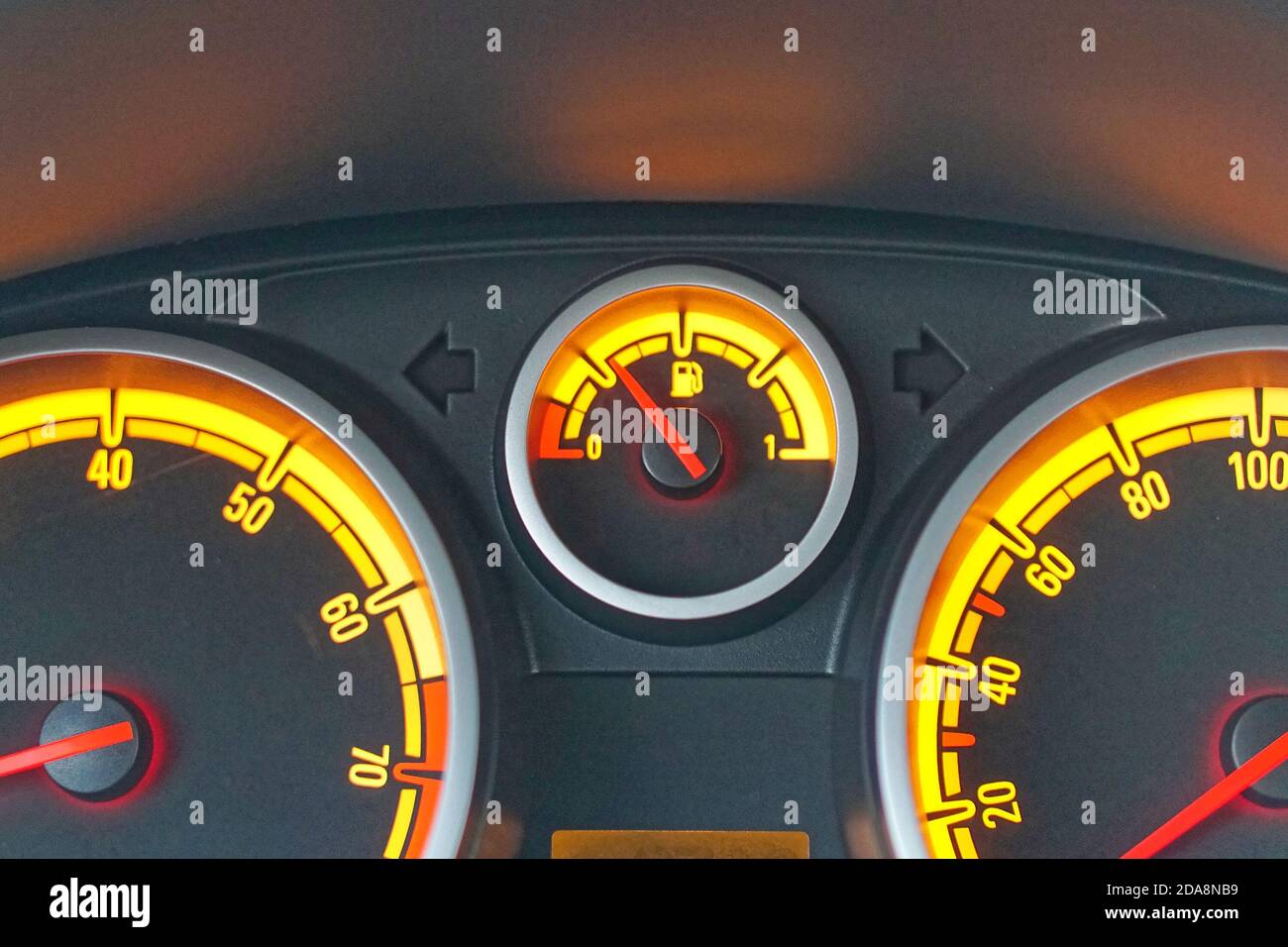 Analog car dashboard fuel gauge with yellow lights Stock Photo Alamy