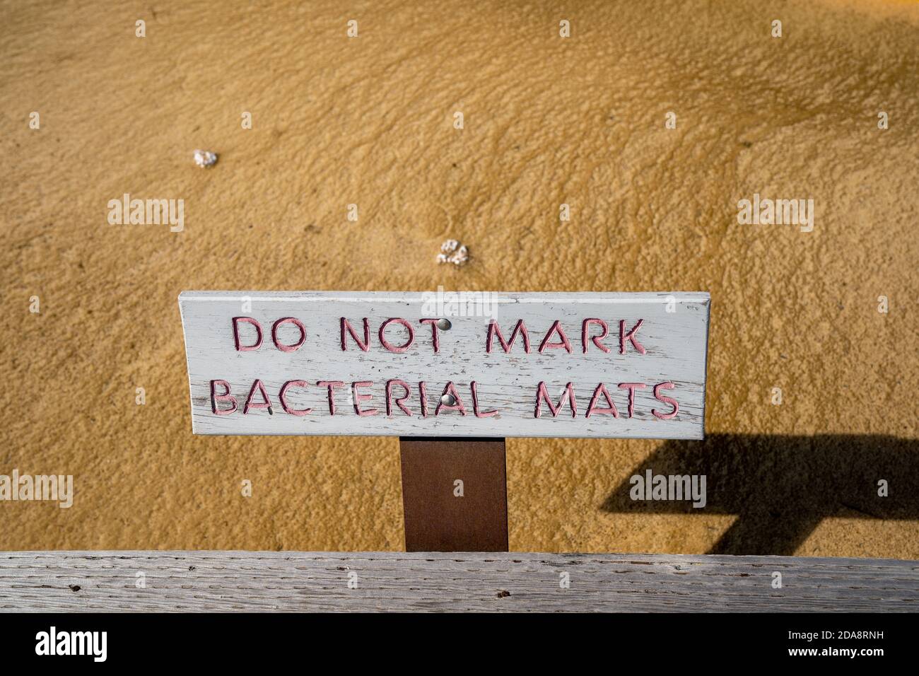 Sign - do not mark bacterial mats in Yellowstone National Park reminds tourists not to deface the enviornment Stock Photo