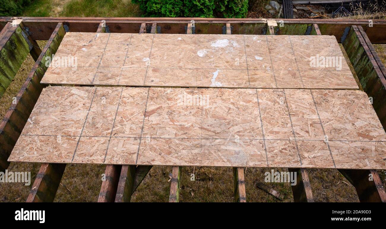 Summer construction, outdoor deck under construction, old support