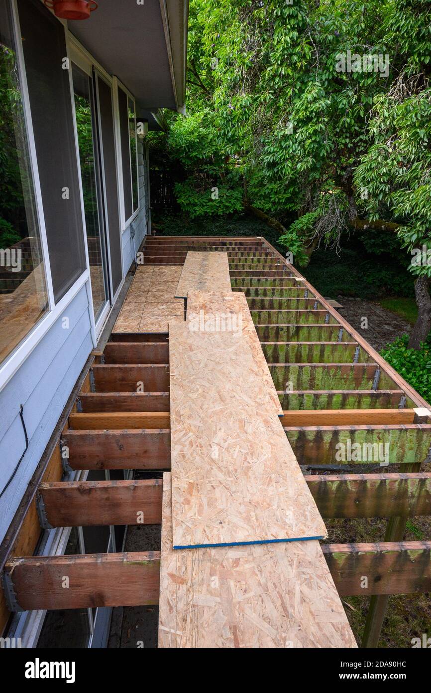 Summer construction, outdoor deck under construction, old support