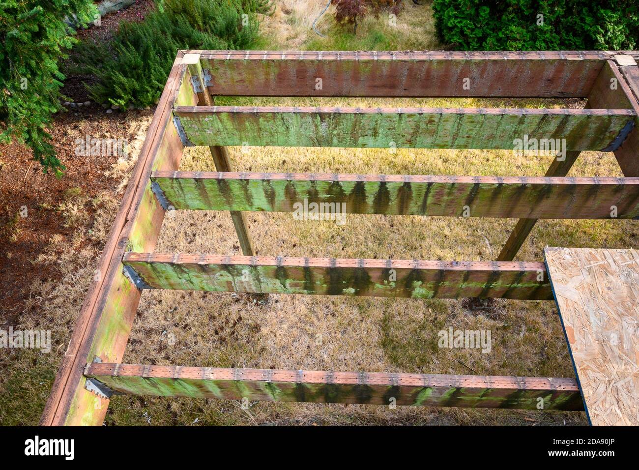 Summer construction, outdoor deck under construction, old support