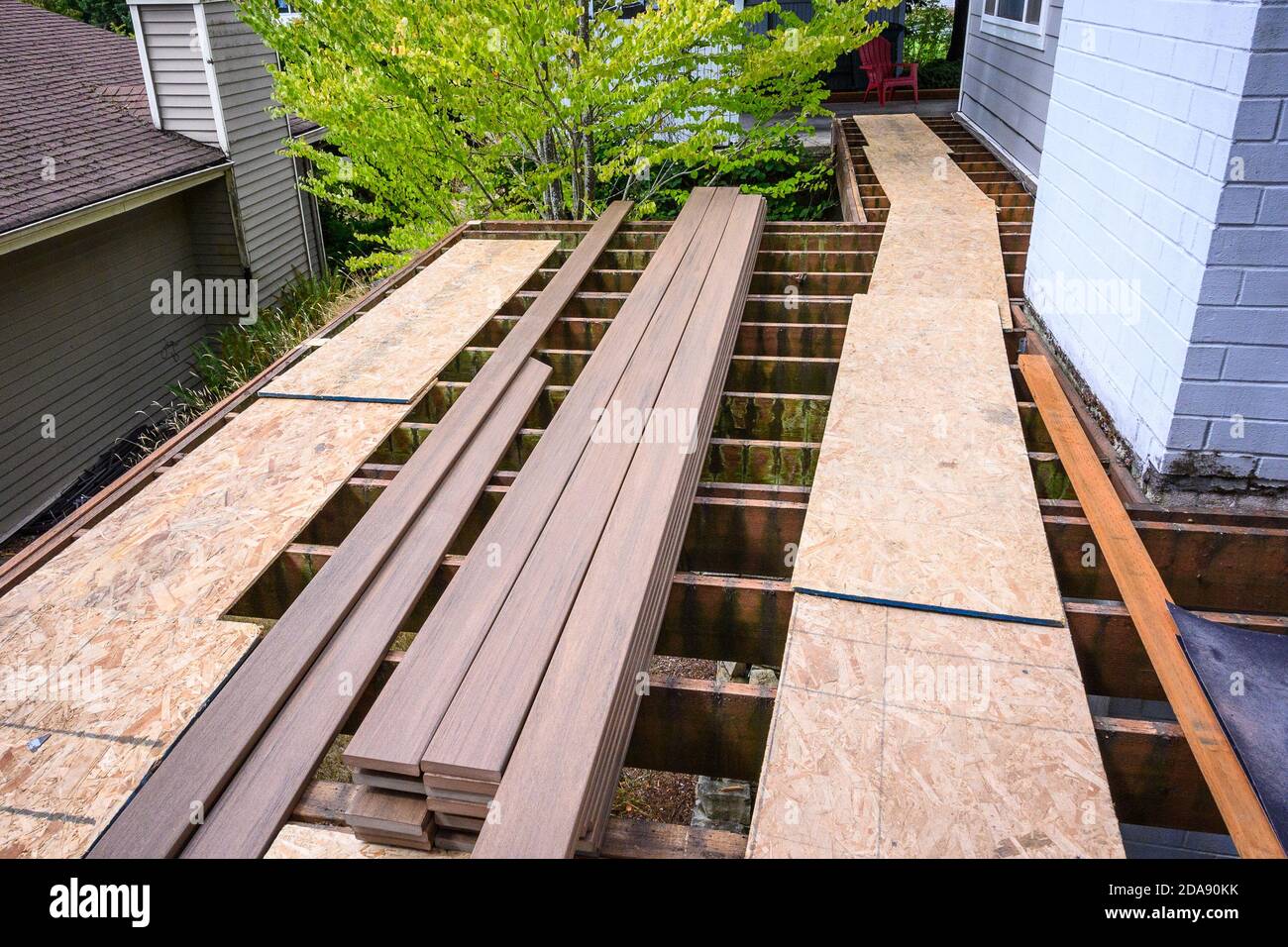 Summer construction, outdoor deck under construction, old support