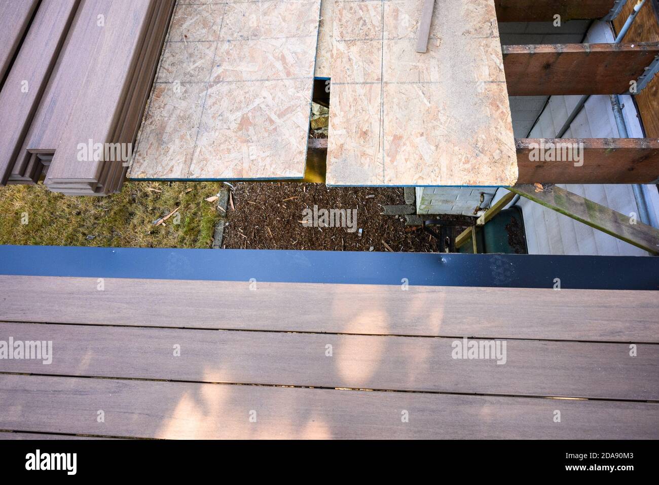 Summer construction, outdoor deck under construction, old support
