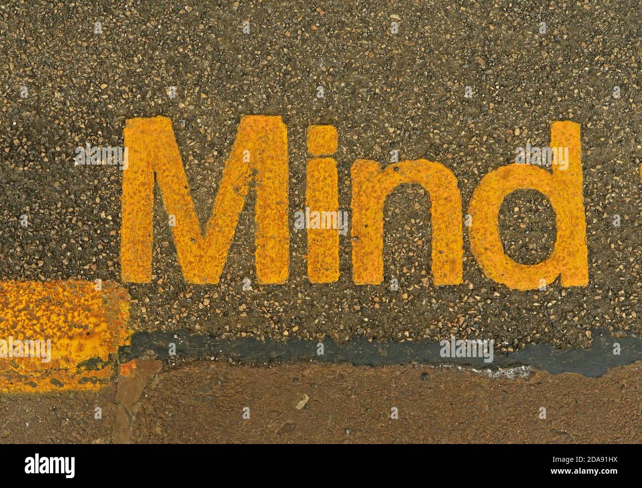 Mind word on pavement, England, UK Stock Photo