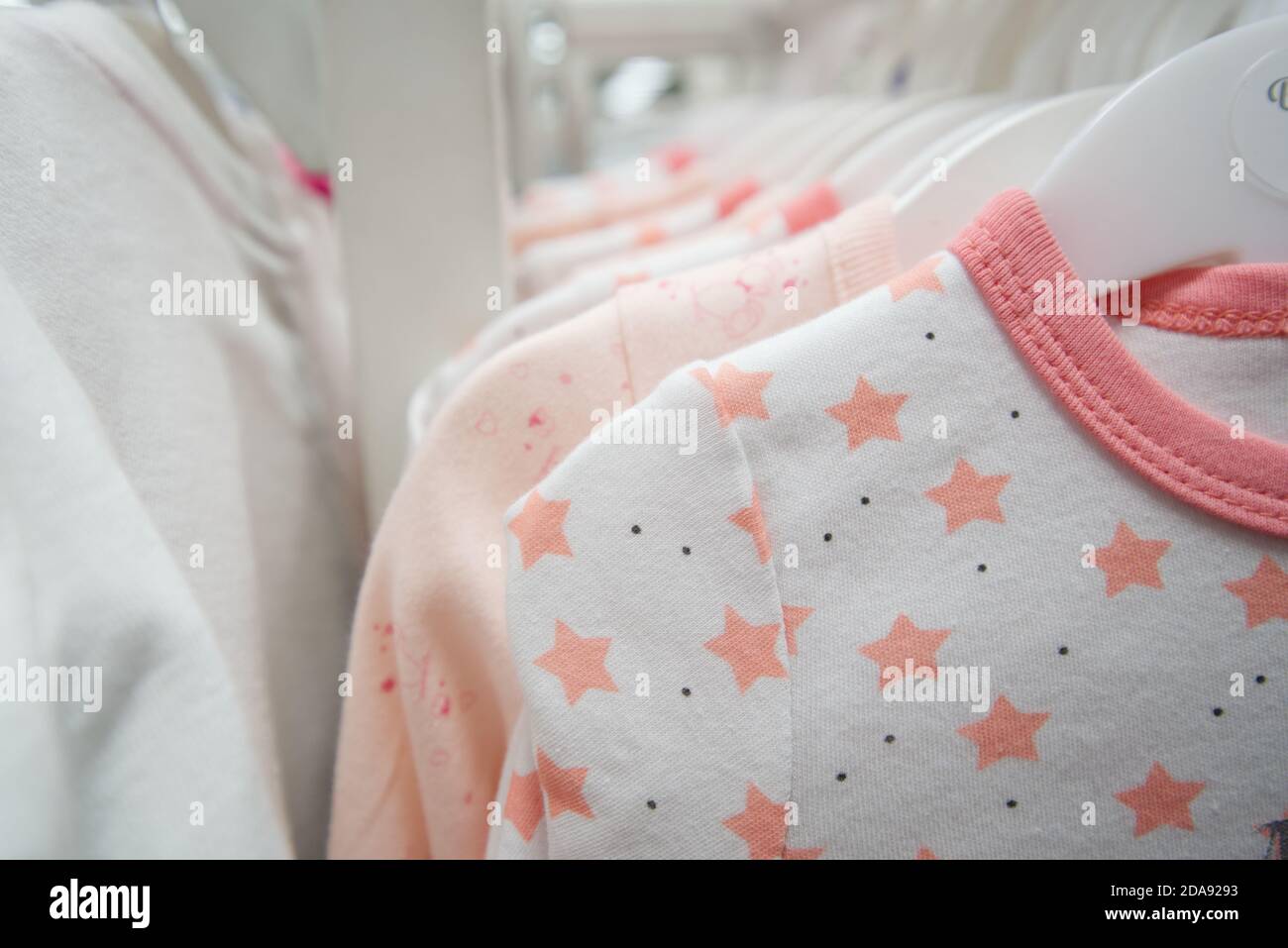Childrens cloth rack in bright color tone with stars Stock Photo