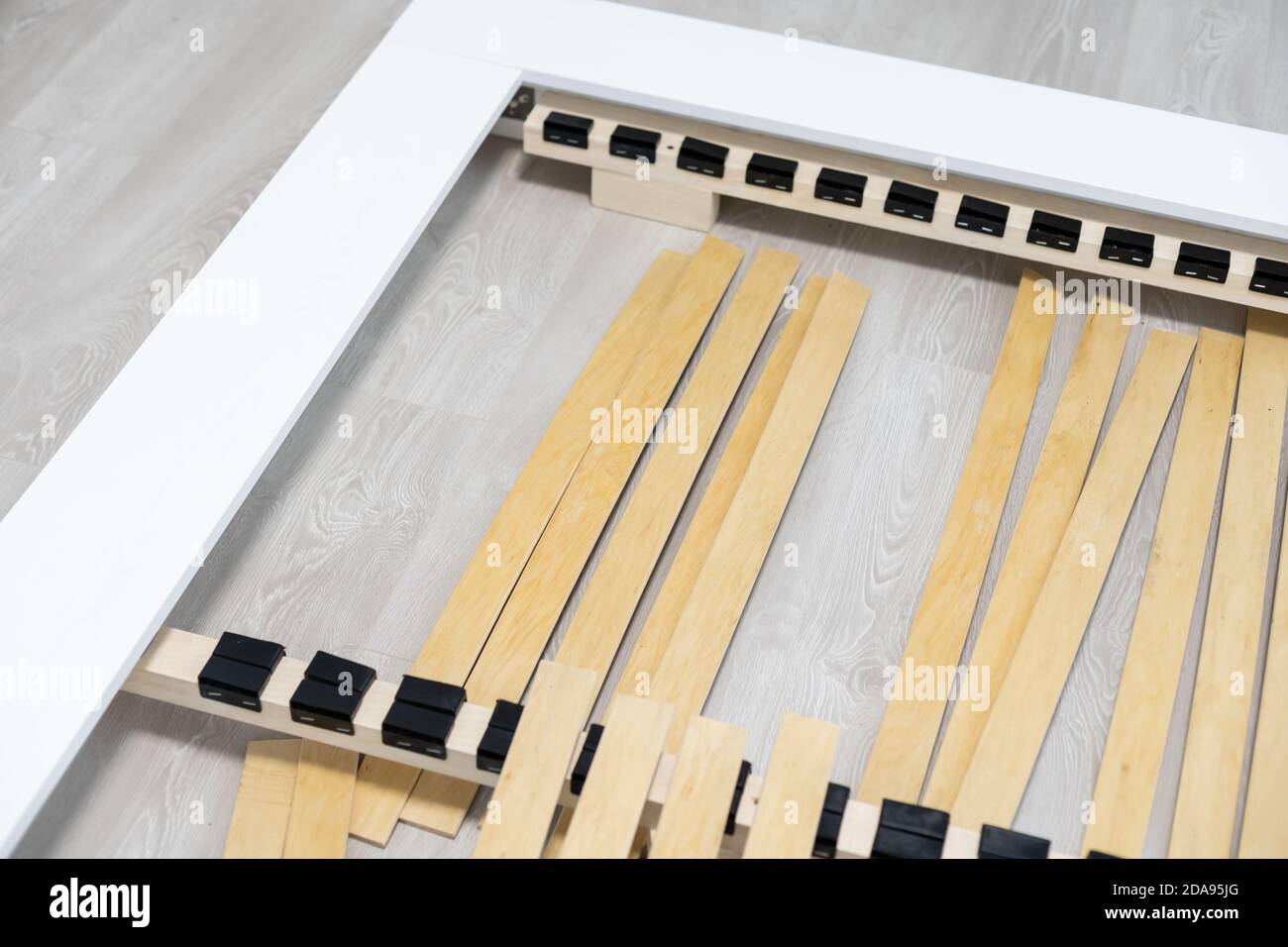 Wooden slats bed, disassembled bed Stock Photo Alamy